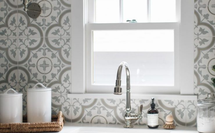 Blue counter and large white farmhouse sink