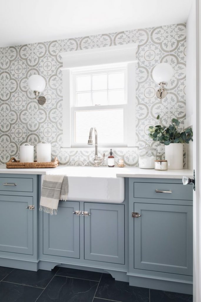 Blue counters and large white farmhouse sink