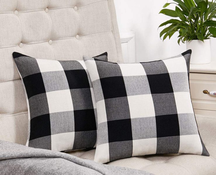 Two black and white gingham throw pillows.