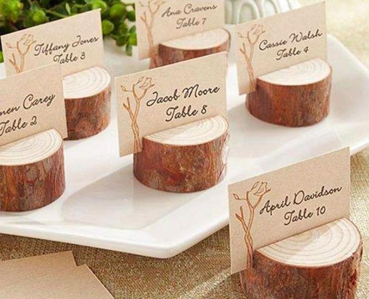 Miniature wooden stumps holding guest names for your country bridal shower
