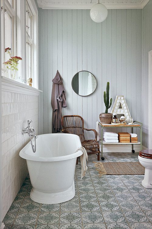 Farmhouse bathroom with freestanding bathtub