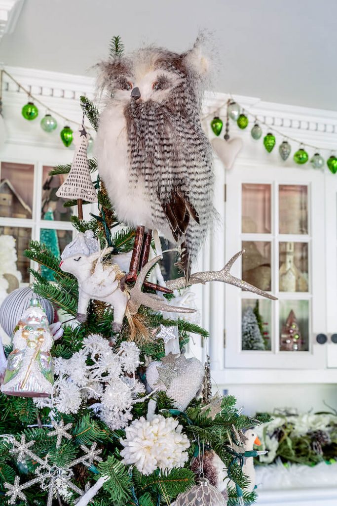 Owl Christmas tree topper for a woodland Christmas theme.
