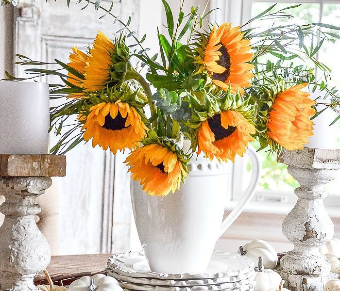 Sunflowers and pumpkins on a centerpiece, from Stone Gable Blog
