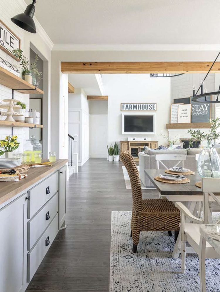 The view from the back of their kitchen stretches all the way back to the living room so that there's an open atmosphere and to make it easier to keep an eye on the kids.