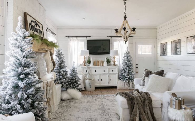 Living room with decorate with Christmas trees around the room