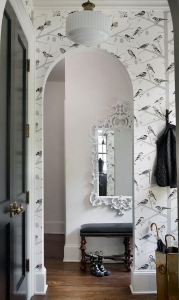 Schumacher bird wallpaper with painted black doors