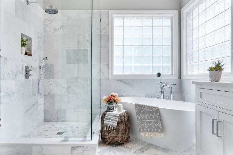 beautiful white marble master bath with high-quality finishes