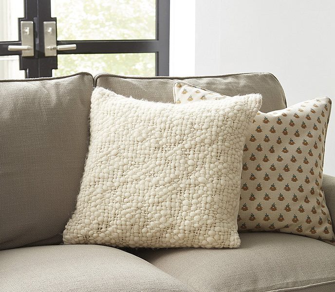 Neutral fall decor with cream knit throw pillow