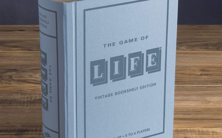 The Game of Life disguised as a light blue, vintage book.
