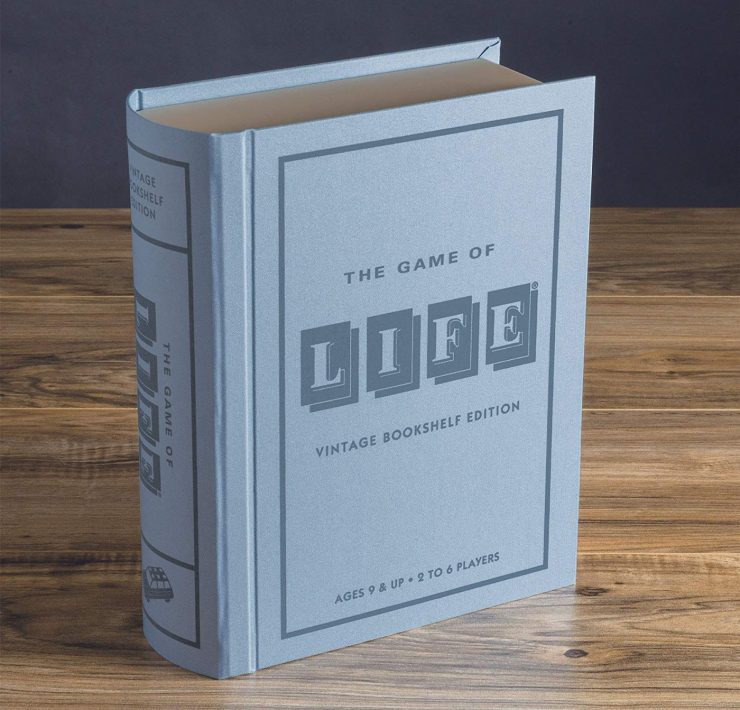 The Game of Life disguised as a light blue, vintage book.
