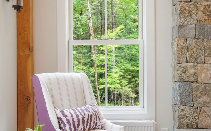 Accent chair in front of windows for farmhouse style