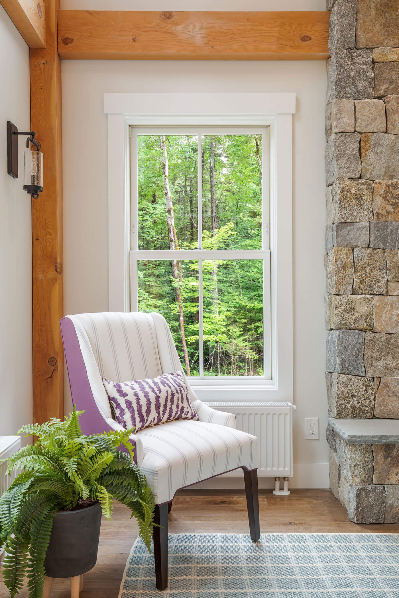 Accent chair in front of windows for farmhouse style