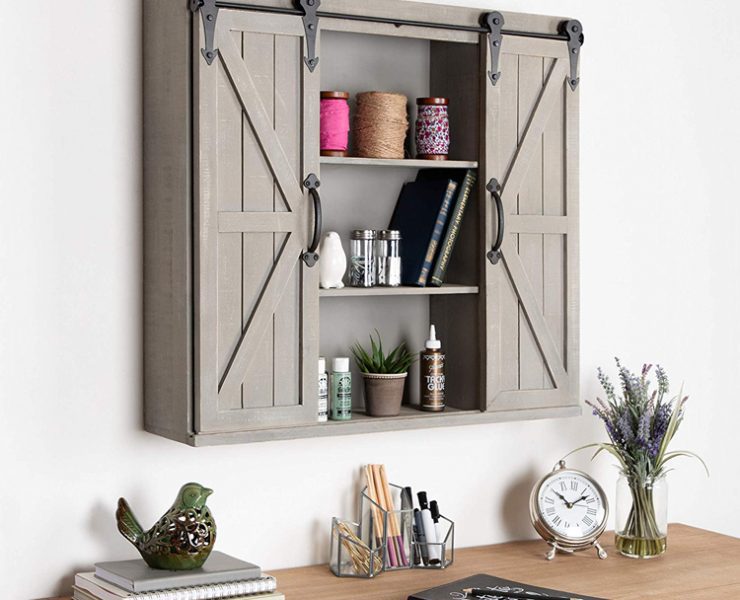 A light gray add-on wall cabinet with sliding barn doors.