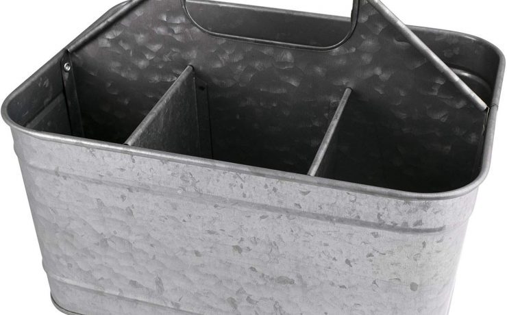 Galvanized metal caddy with wooden handle and six compartments, perfect for a furniture clean and repair kit.