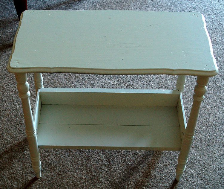 Before picture: Plain, light green side table.