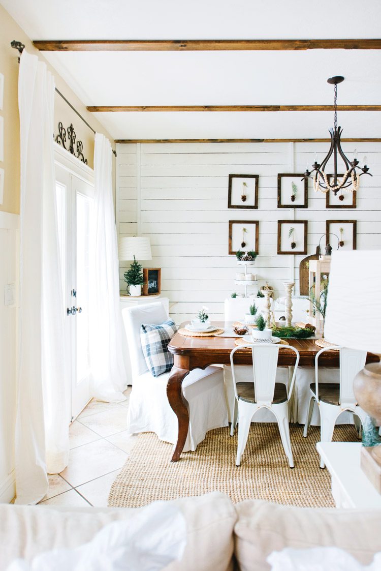 Utah farmhouse dinging room with a white shiplap wall.