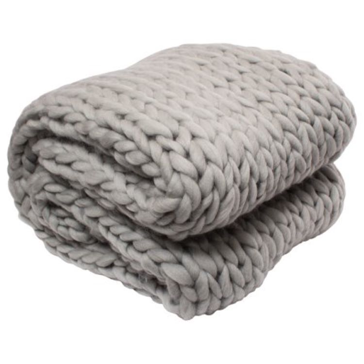 Black Friday deal on a comfy white throw