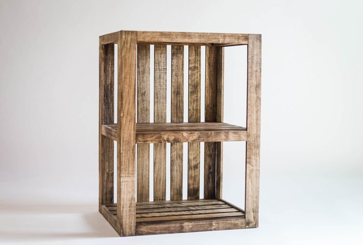 Wood crate repurposed as a side table/shelf.