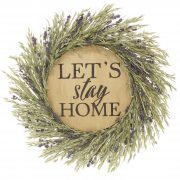 Lavender wreath framed "Let's Stay Home" wood sign in our gift guide.