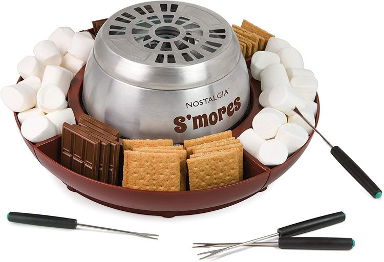 A small, indoor, portable smores station with compartments for the food pieces.