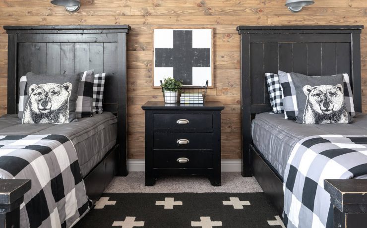 Plaid bedding in black and white boys room