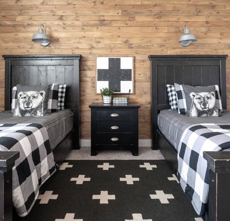 Plaid bedding in black and white boys room