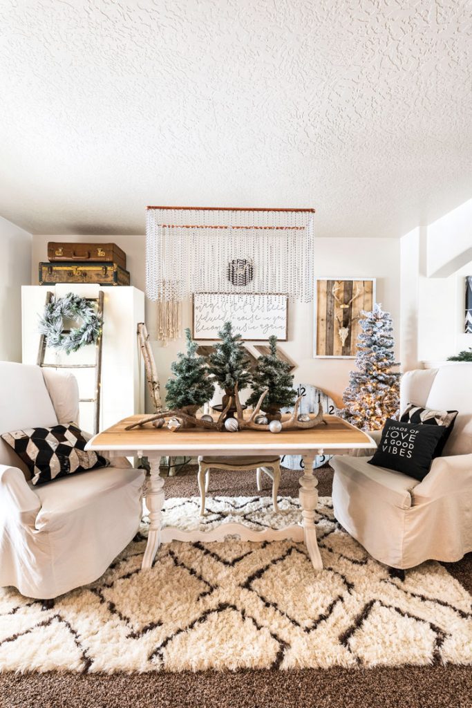 Dining room with metallic Christmas touches and slip covered chairs