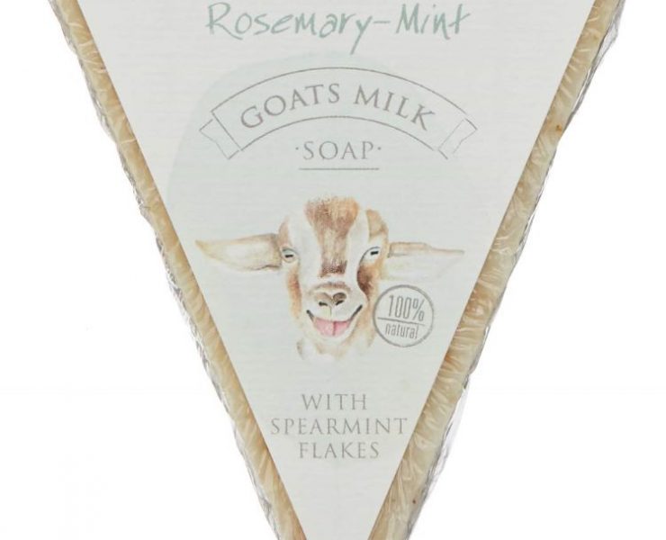 A slice of rosemary mint goat's milk soap bar with a picture of a goat