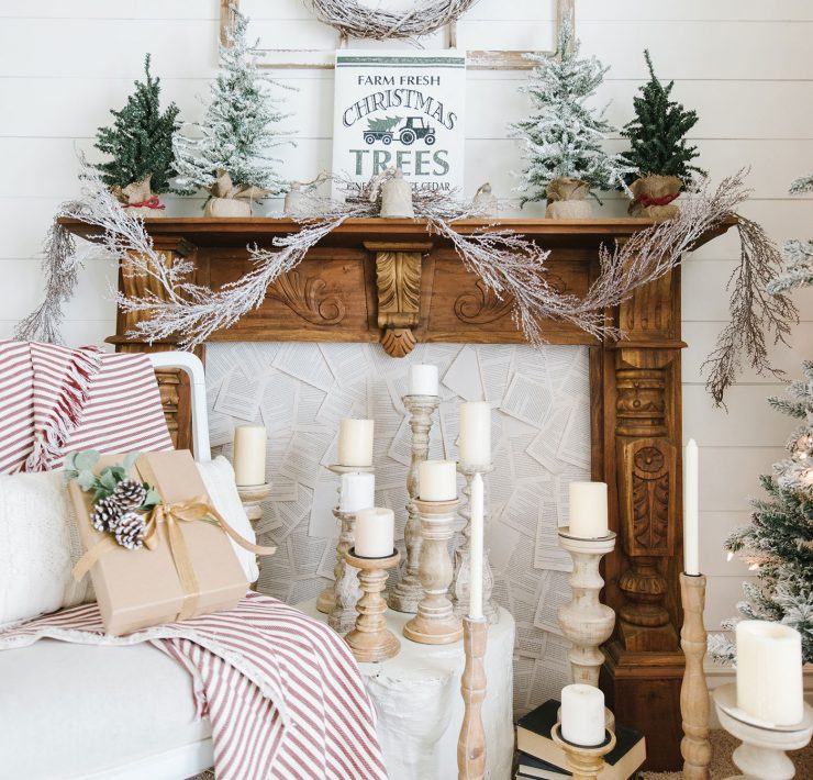 Mantel with book pages, christmas decor and family keepsakes