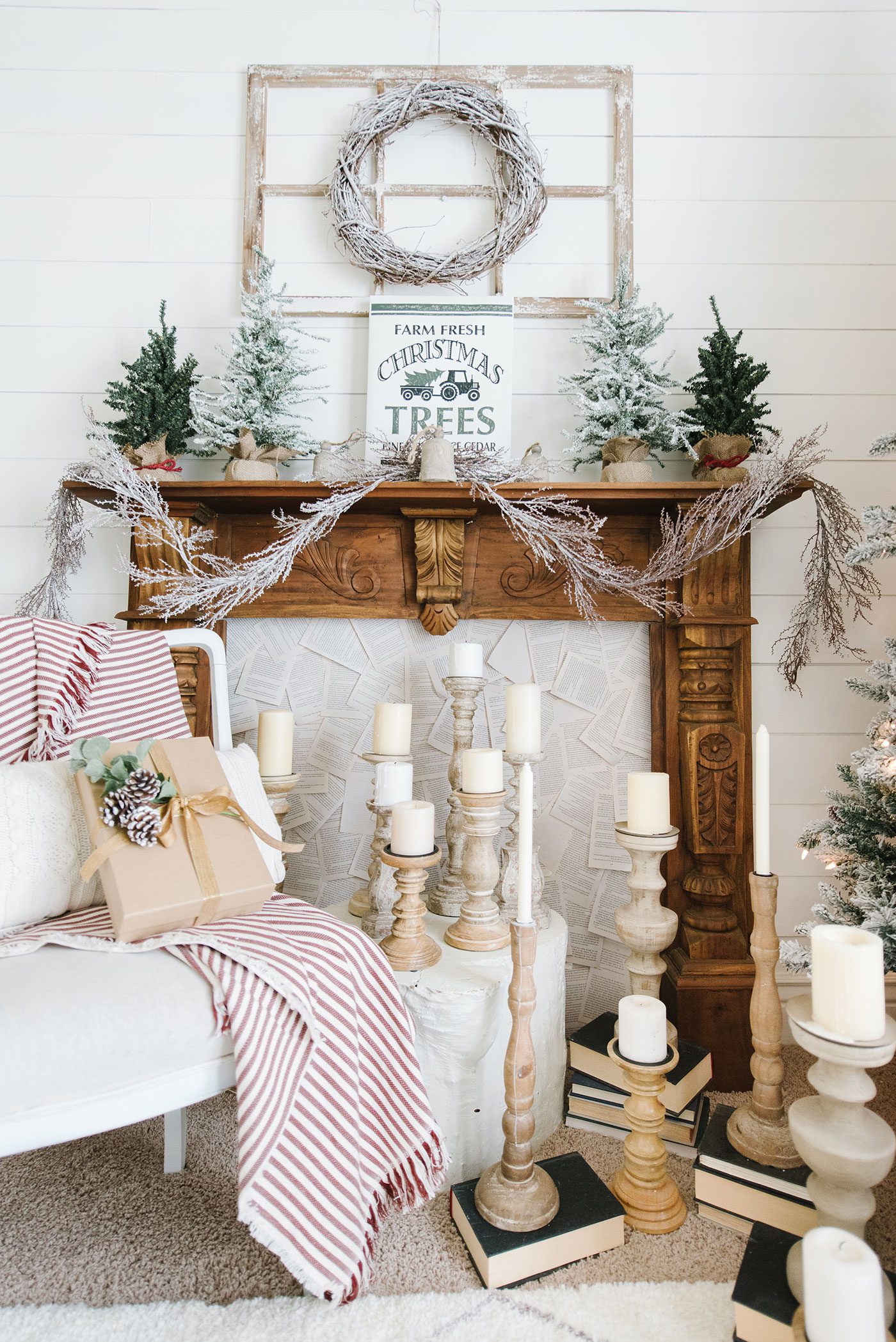 Mantel with book pages, christmas decor and family keepsakes