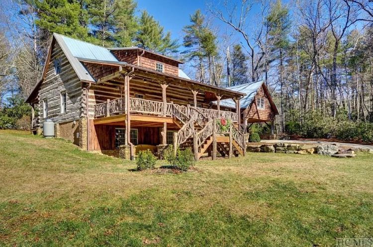 The back deck of the property can be reached from the back stairs or the second floor