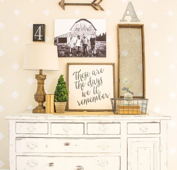 Chippy milk paint dresser with dresser decor and sign art
