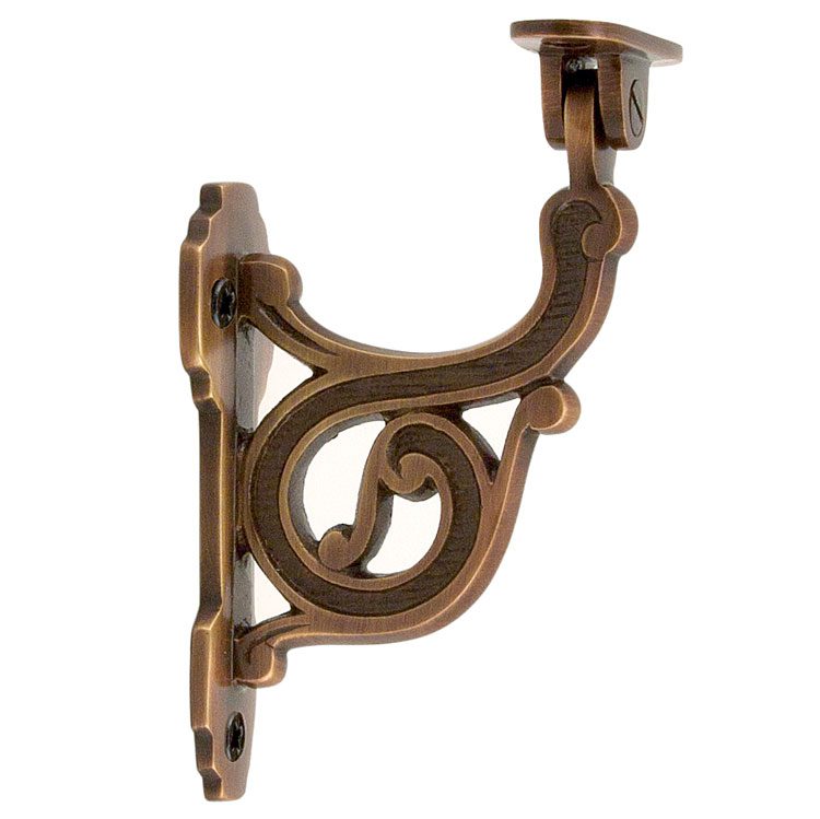 A scrolled solid brass handrail in bronze is a great yet simple remodel essential. 