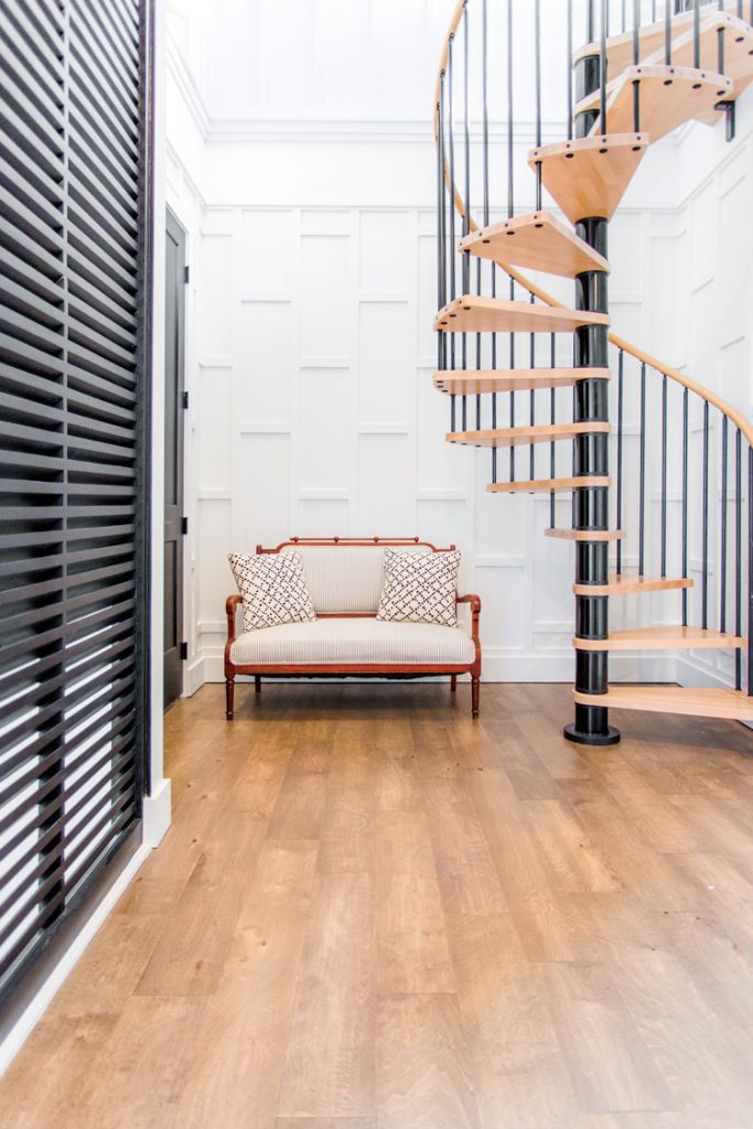 Hallway with round staircase