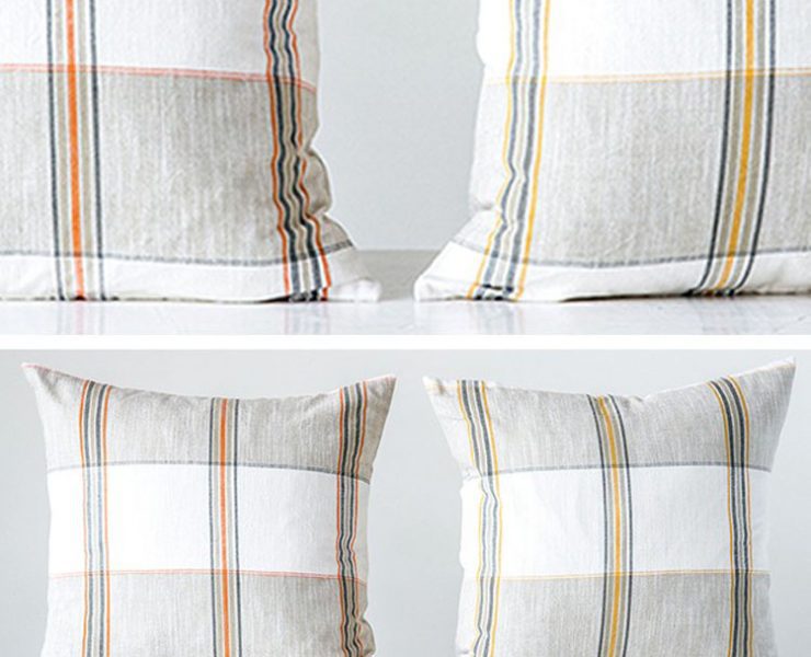 Lightly-colored plaid accent pillows.