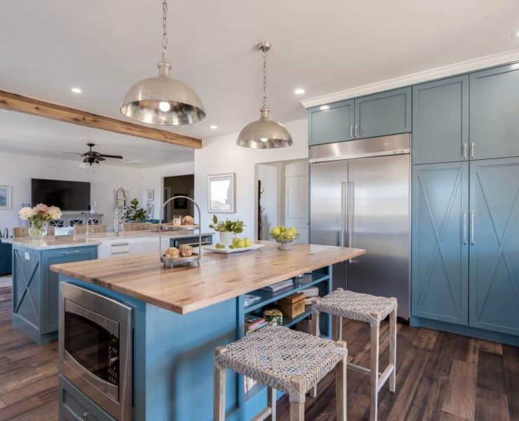 Farmhouse-style paneling in the kitchen island and in the large cabinets