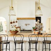 European farmhouse style kitchen with butcher block island