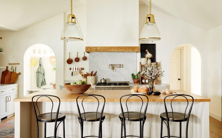 European farmhouse style kitchen with butcher block island