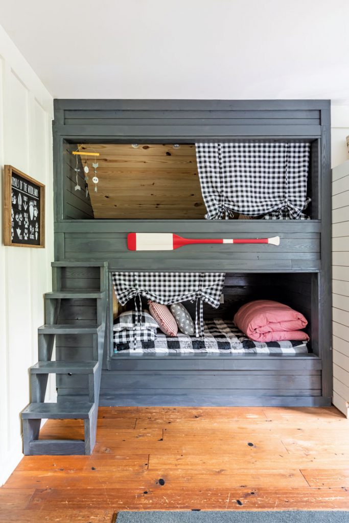 Boys bunk room with two bunk beds, painted dark gray