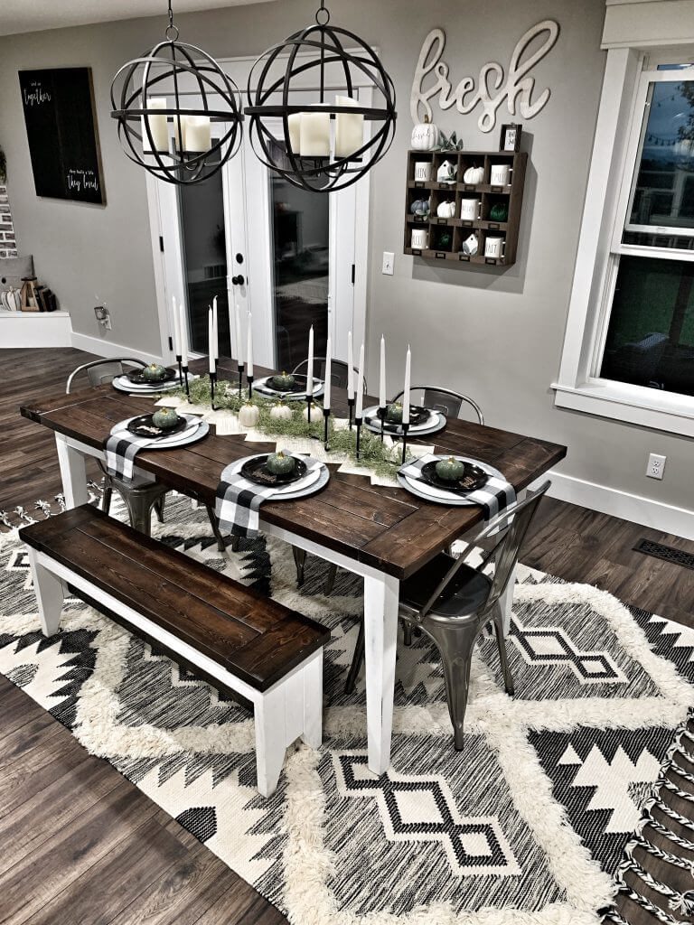 Gray and white dining room with geometric rug