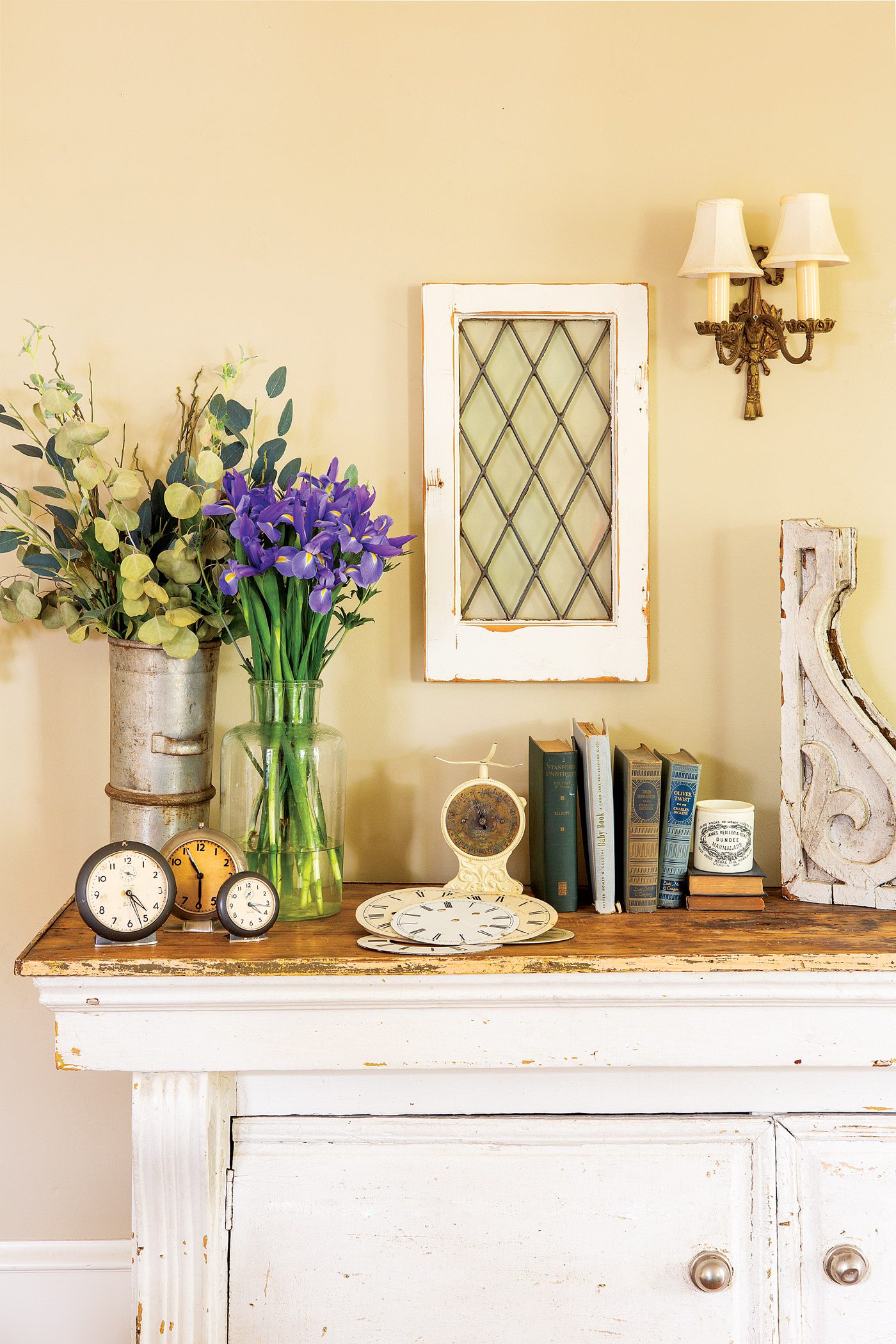 Dresser with vintage collectibles, including old corbels