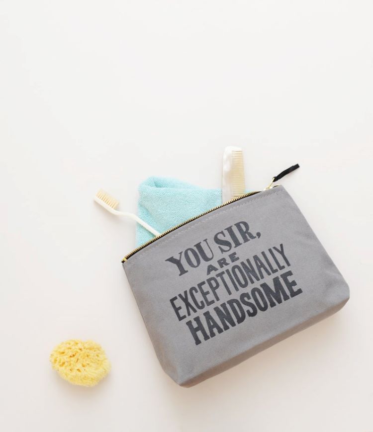 A washbag with the words, "you sir, are exceptionally handsome."
