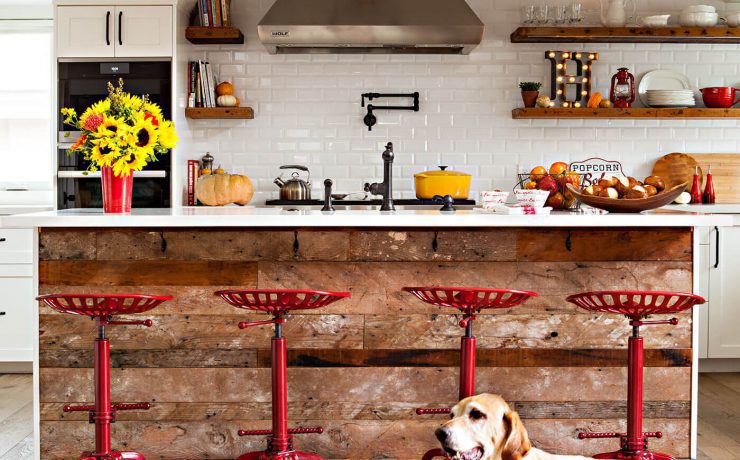 Rustic kitchen with metal accents and dog sitting in front