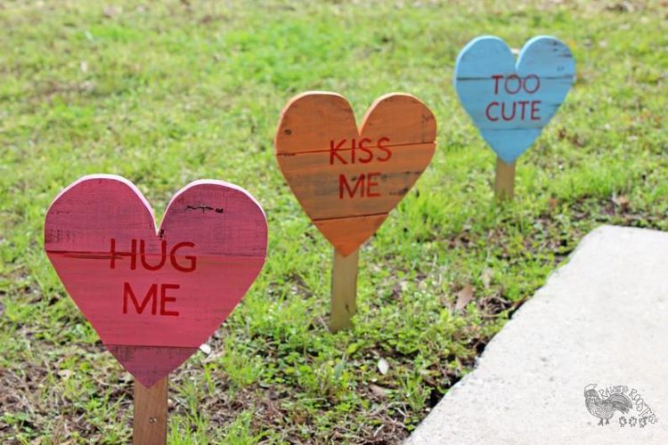 Valentine's Day conversation hearts as lawn art stakes