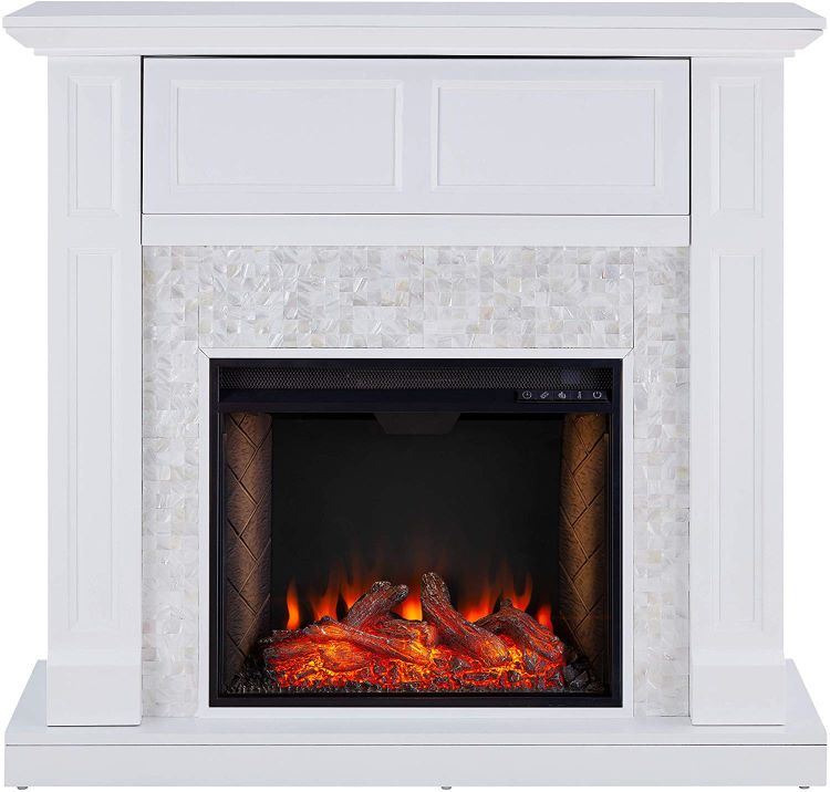 A white mantelpiece with white tile surround