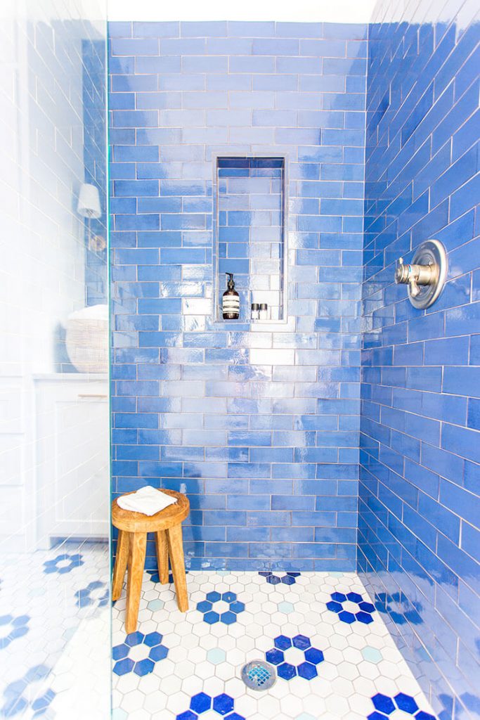 Blue and white tile in walk-in shower