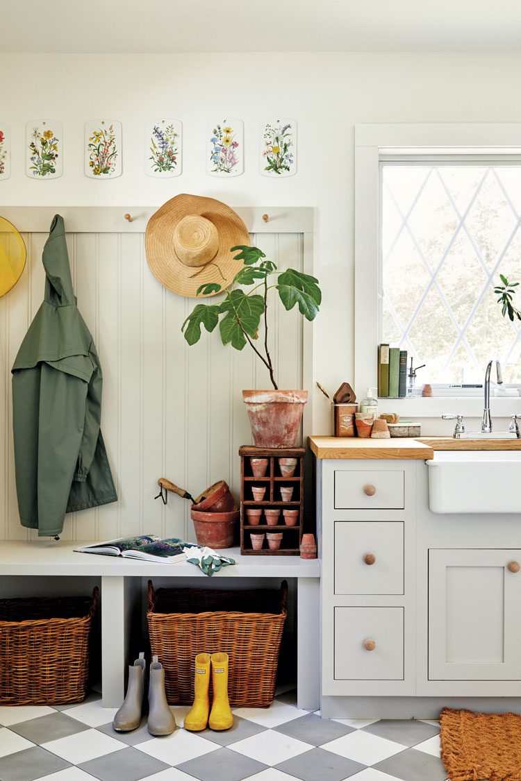 The home's mudroom incorporates grey and white checkered floor