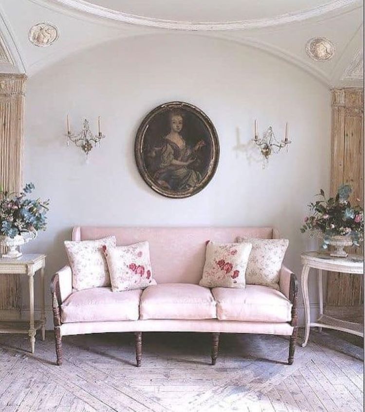 his pink sofa is a perfect part of the design of the room