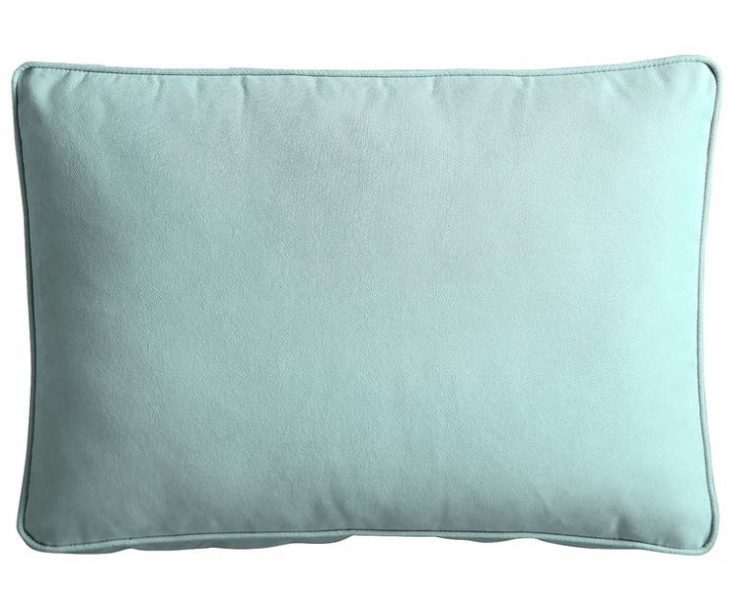 A light blue cushion large enough for a loveseat