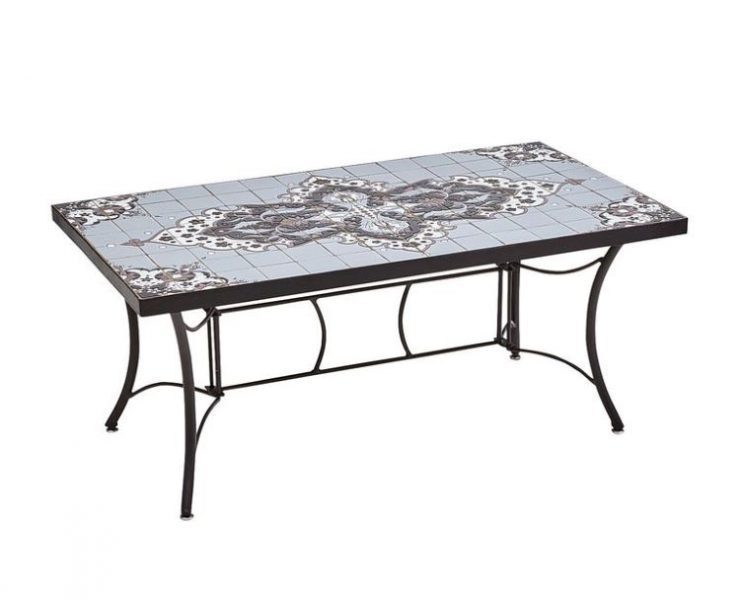 A coffee table with tile in a mosiac pattern in colors of grey, dark blue and white cream